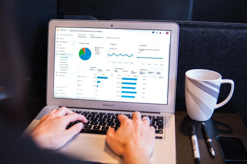 Computer screen with various graphs and charts.