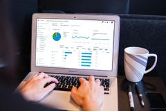 Computer screen with various graphs and charts.